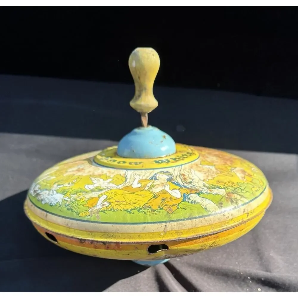 The J CHEIN & Company Early Disney Snow White & 7 Dwarfs Spin Top Tin Needs TLC